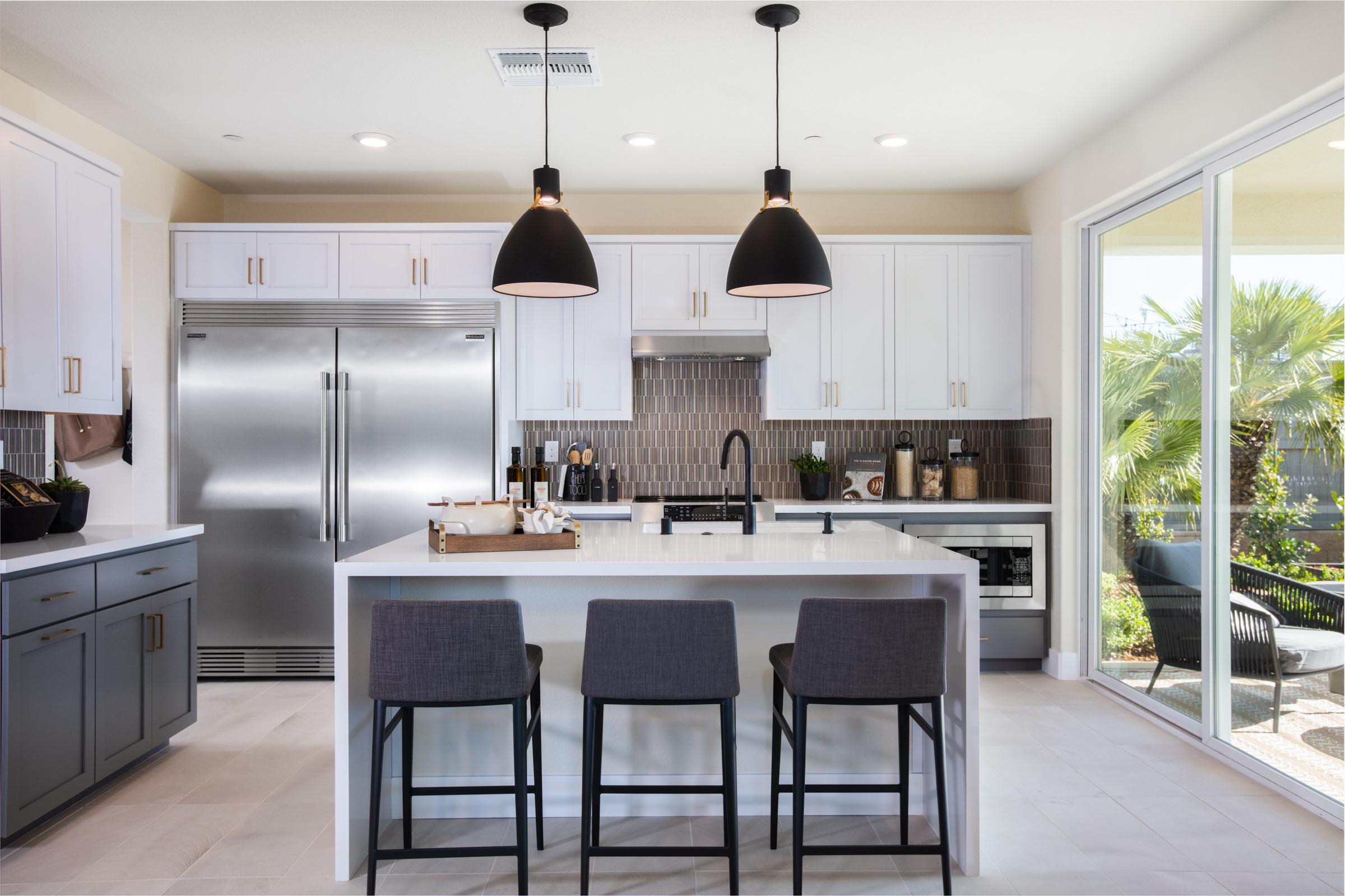 Luxury kitchen with marble countertops and brass fixtures