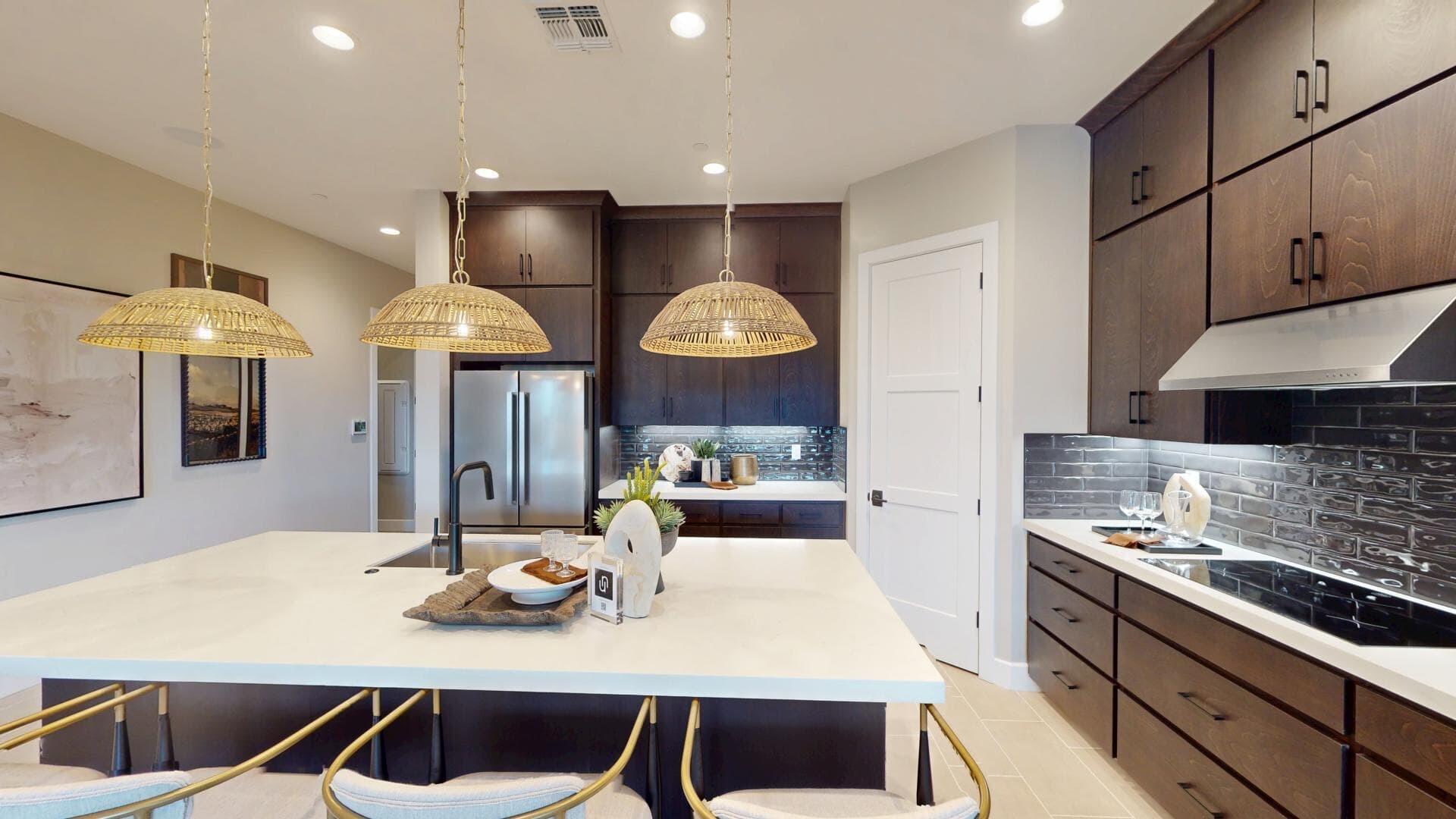 Kitchen with organized pantry and custom cabinetry