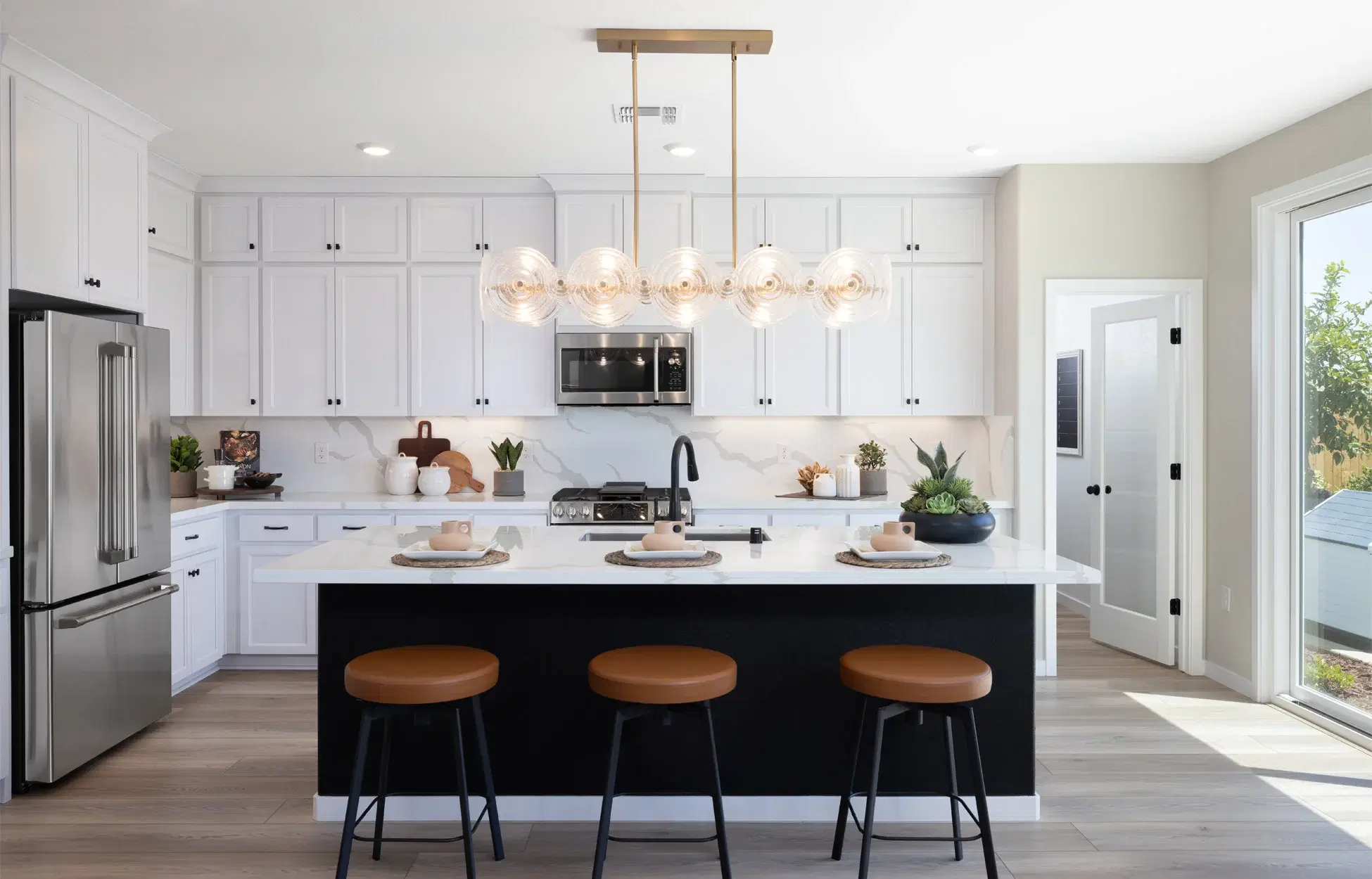 Kitchen with organized pantry and custom cabinetry