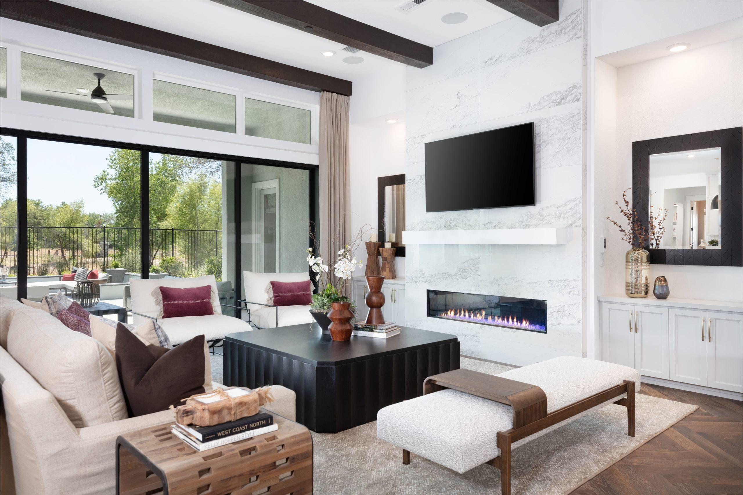 Contemporary kitchen with dark wood cabinets and marble countertops