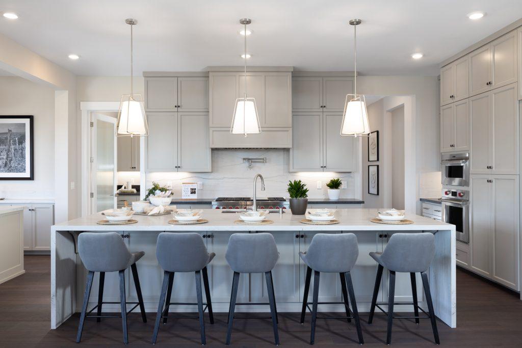 Luxury kitchen with marble countertops and brass fixtures
