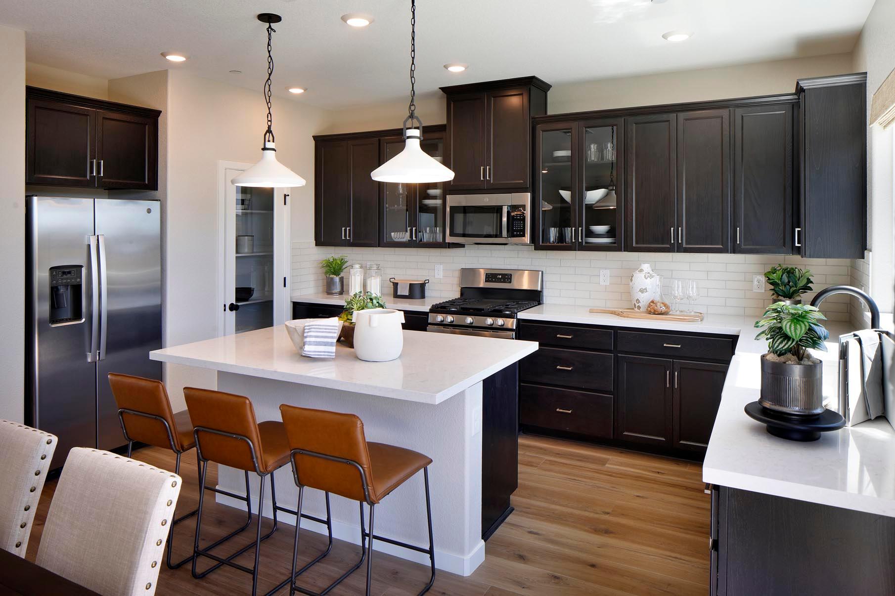 Open concept kitchen and dining area with natural lighting