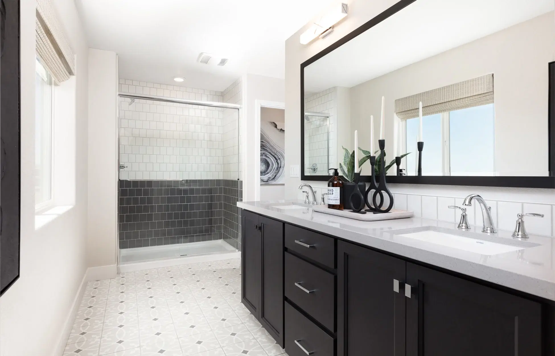 Contemporary kitchen with dark wood cabinets and marble countertops