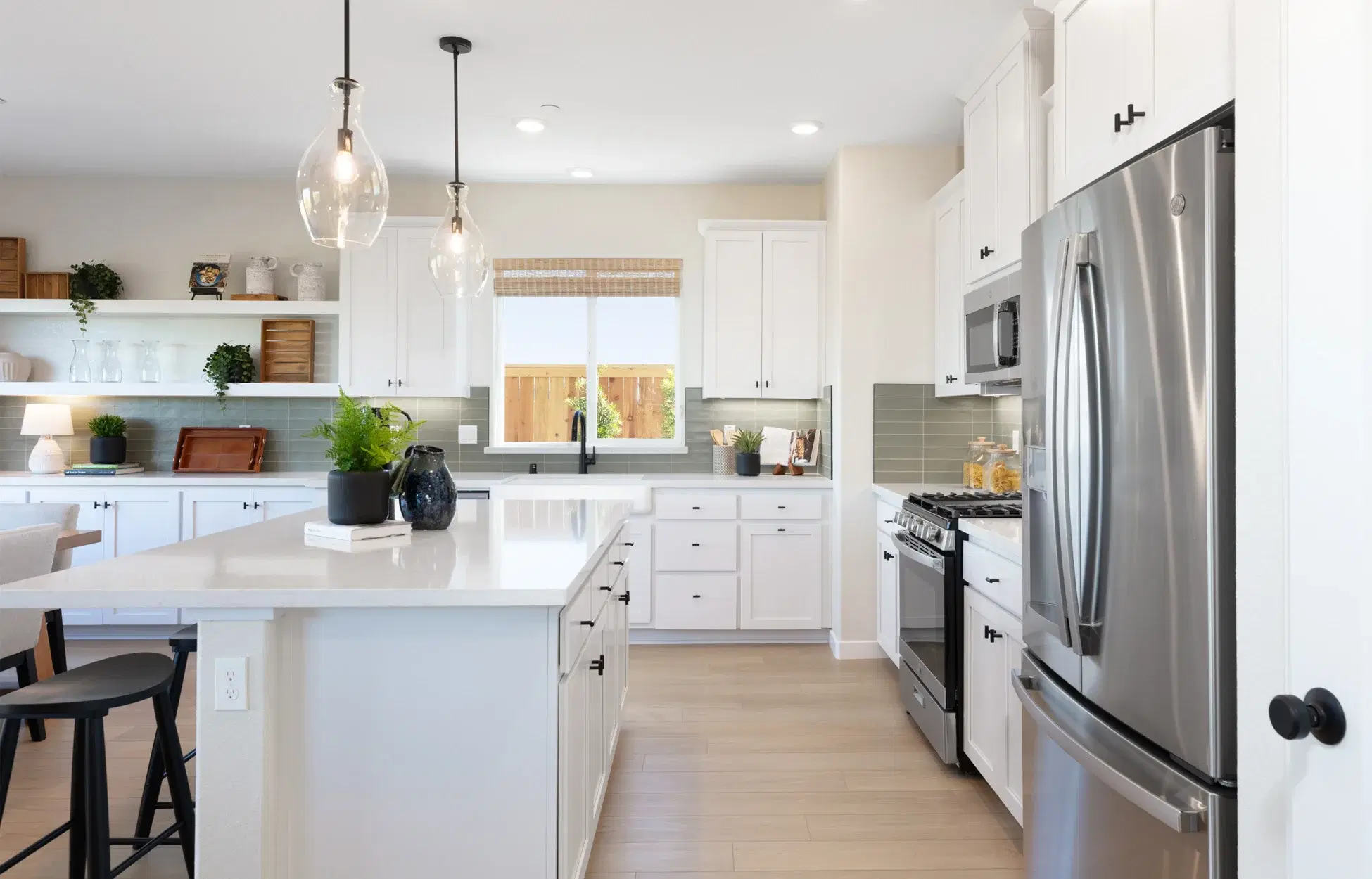 Kitchen island with bar seating and modern fixtures