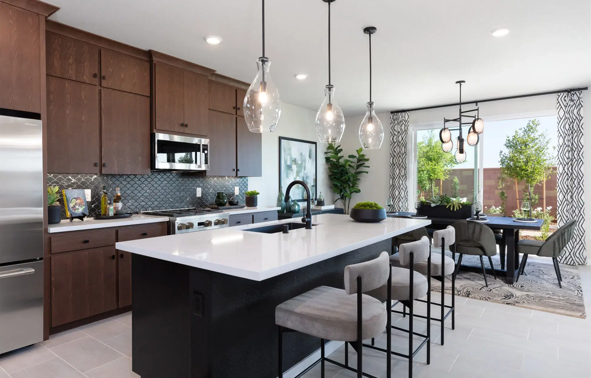 Open concept kitchen and dining area with natural lighting