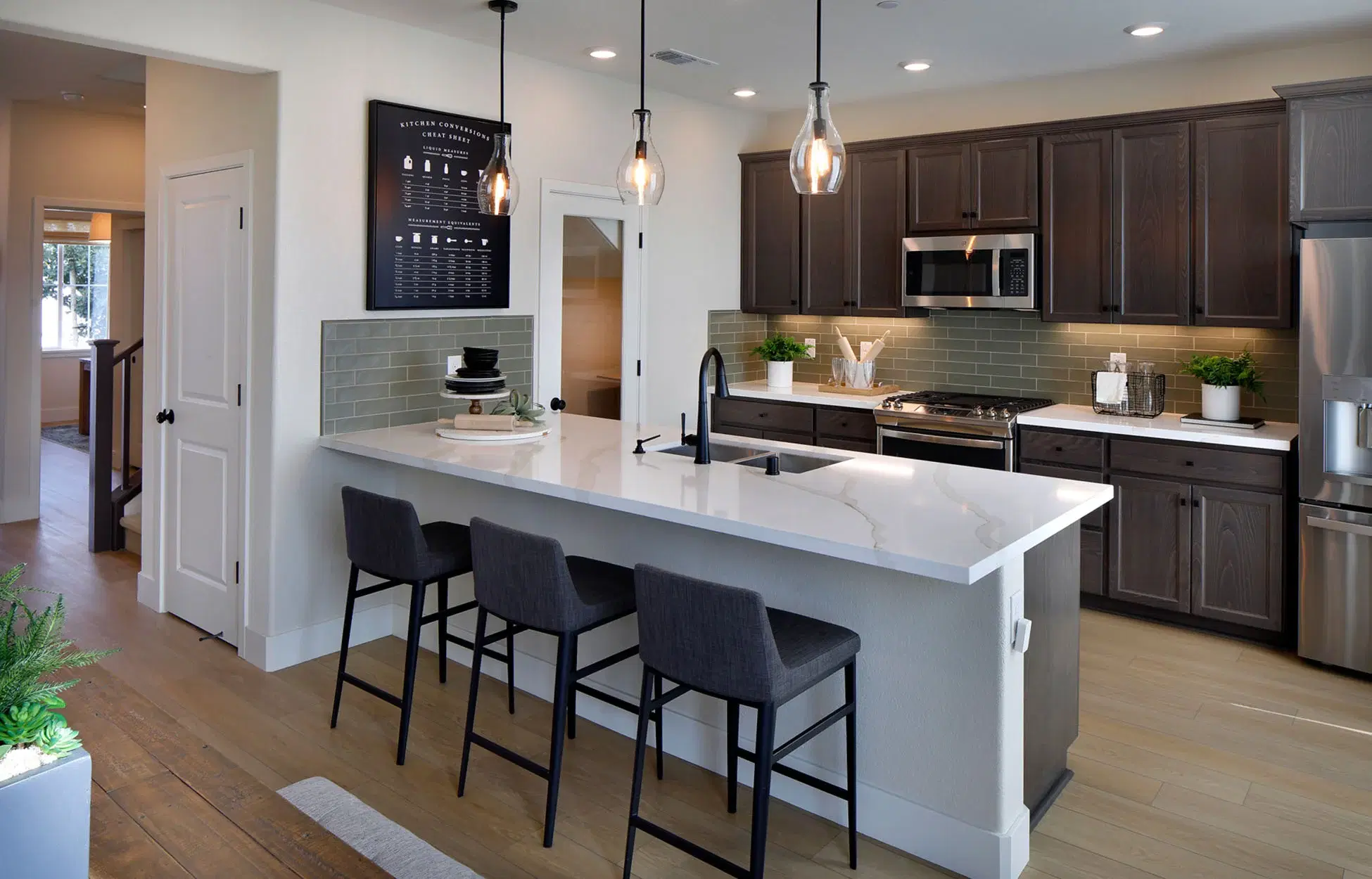 Luxury kitchen with marble countertops and brass fixtures