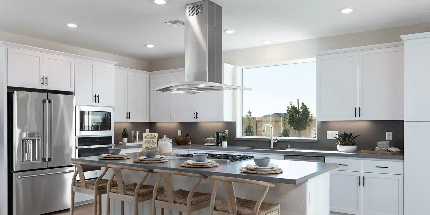 Contemporary kitchen with dark wood cabinets and marble countertops