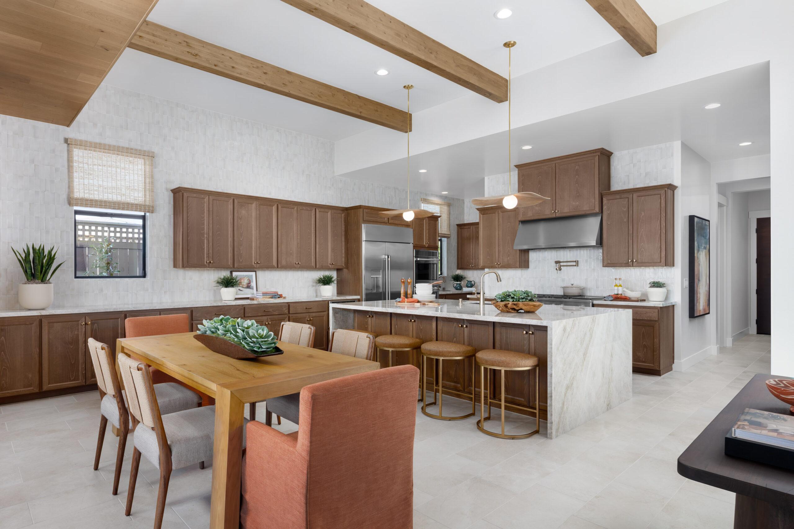 Luxury kitchen with marble countertops and brass fixtures